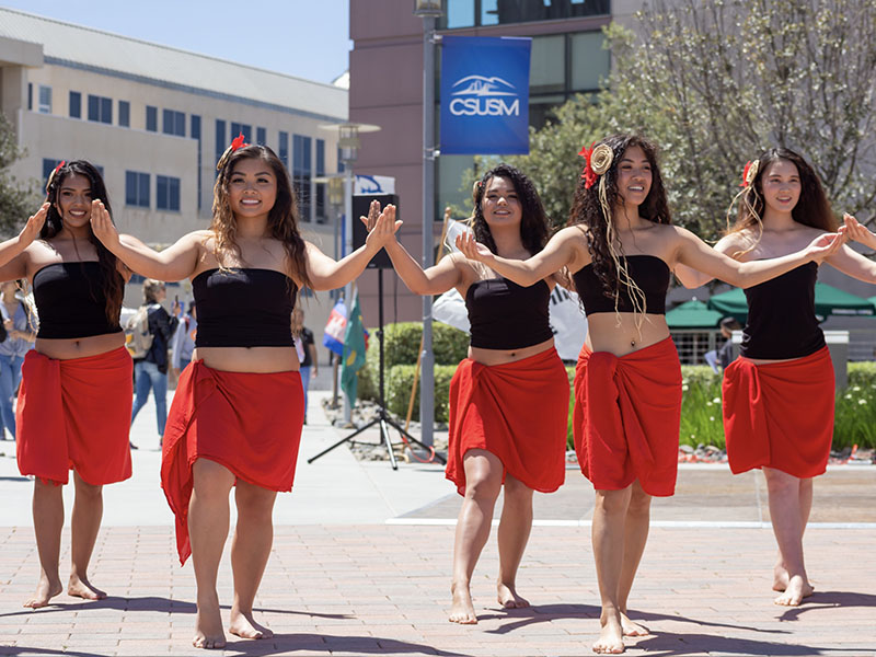 Women dancing at a campus event