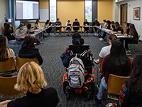 students in a board room