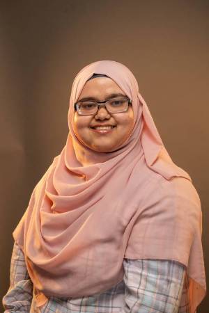 Faheema smiling