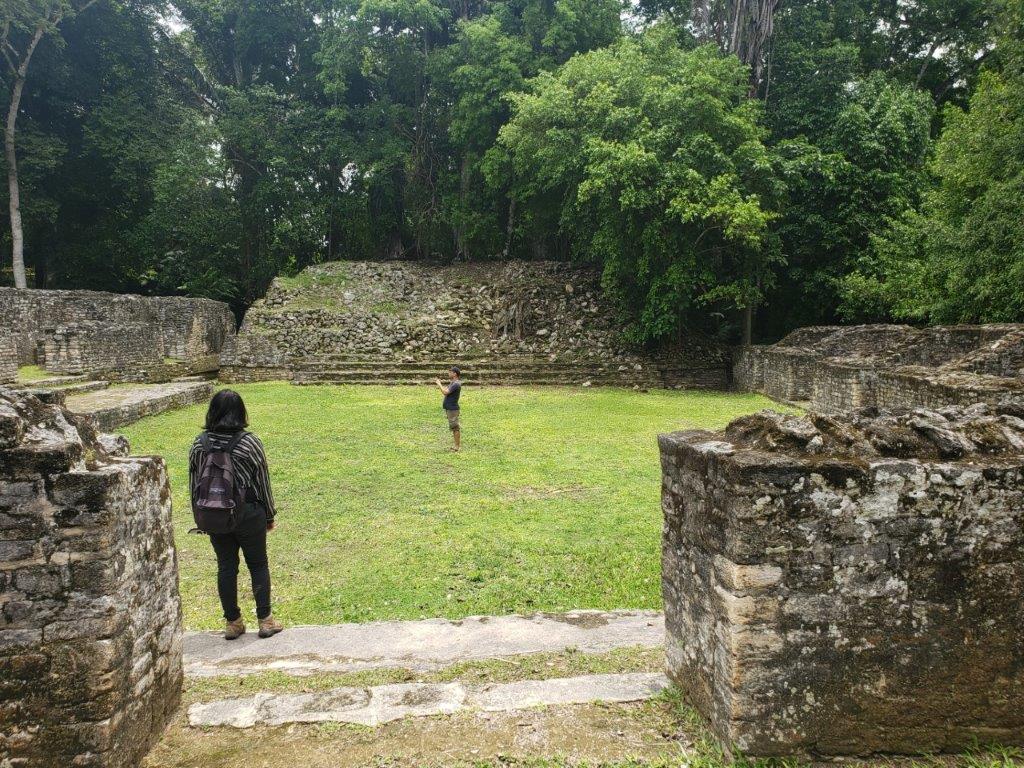 Arian and Mike in a Maya plaza in the ancient city of Caracol.