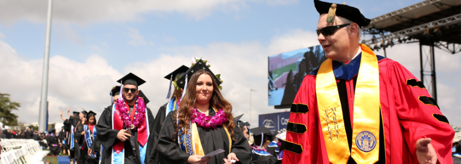 Faculty marshall leading graduates