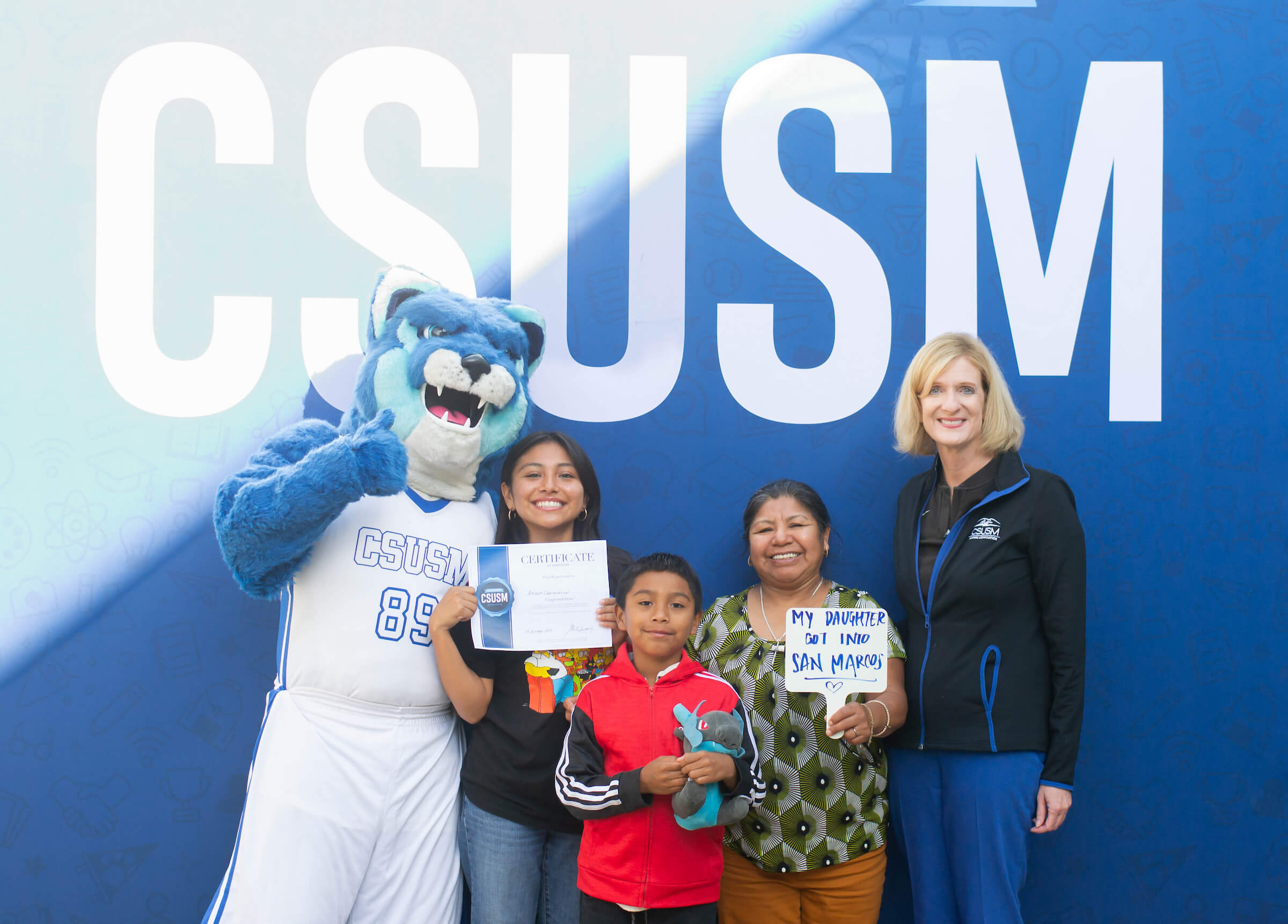 family celebrating for admission