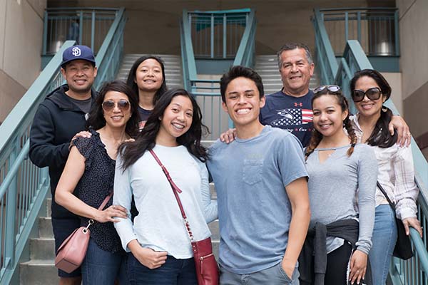 Family posing on campus