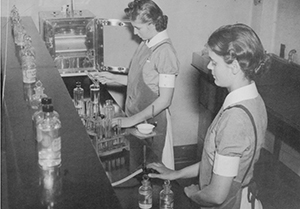 Jean Quinby (right) in a lab while training to become an RN in the 1940s.