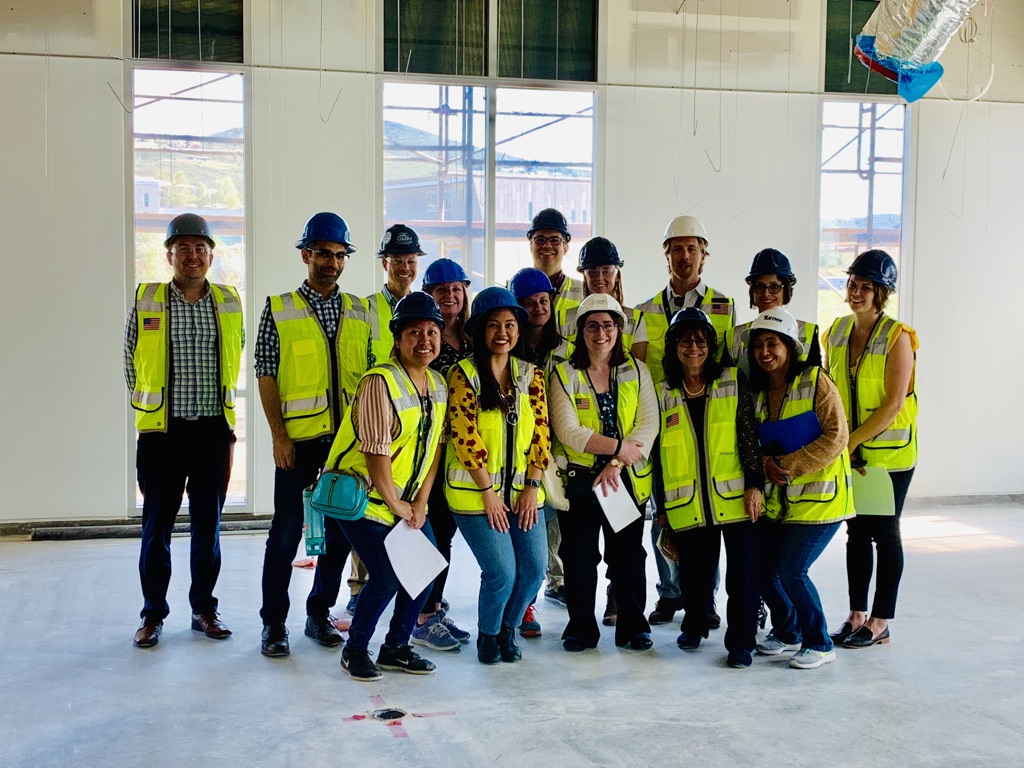Students and staff at construction site
