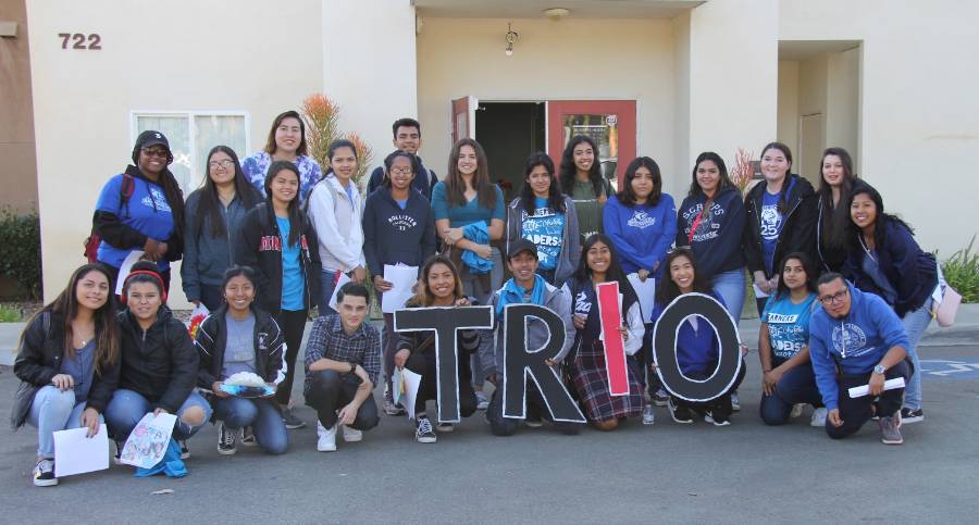 Students holding TRIO sign