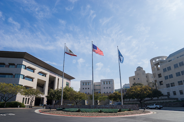 Students holding CSUSM