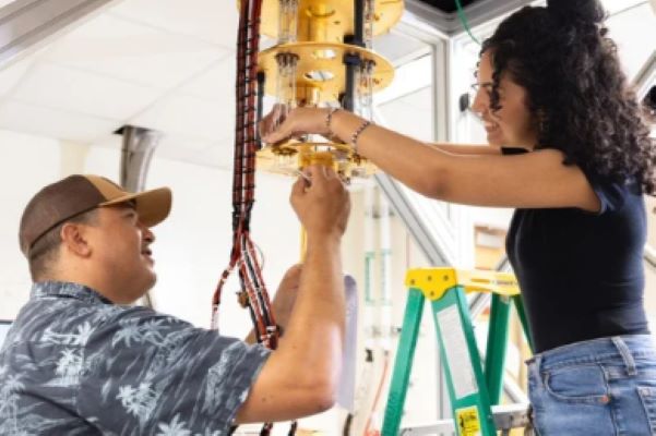 physicists working in a quantum information lab