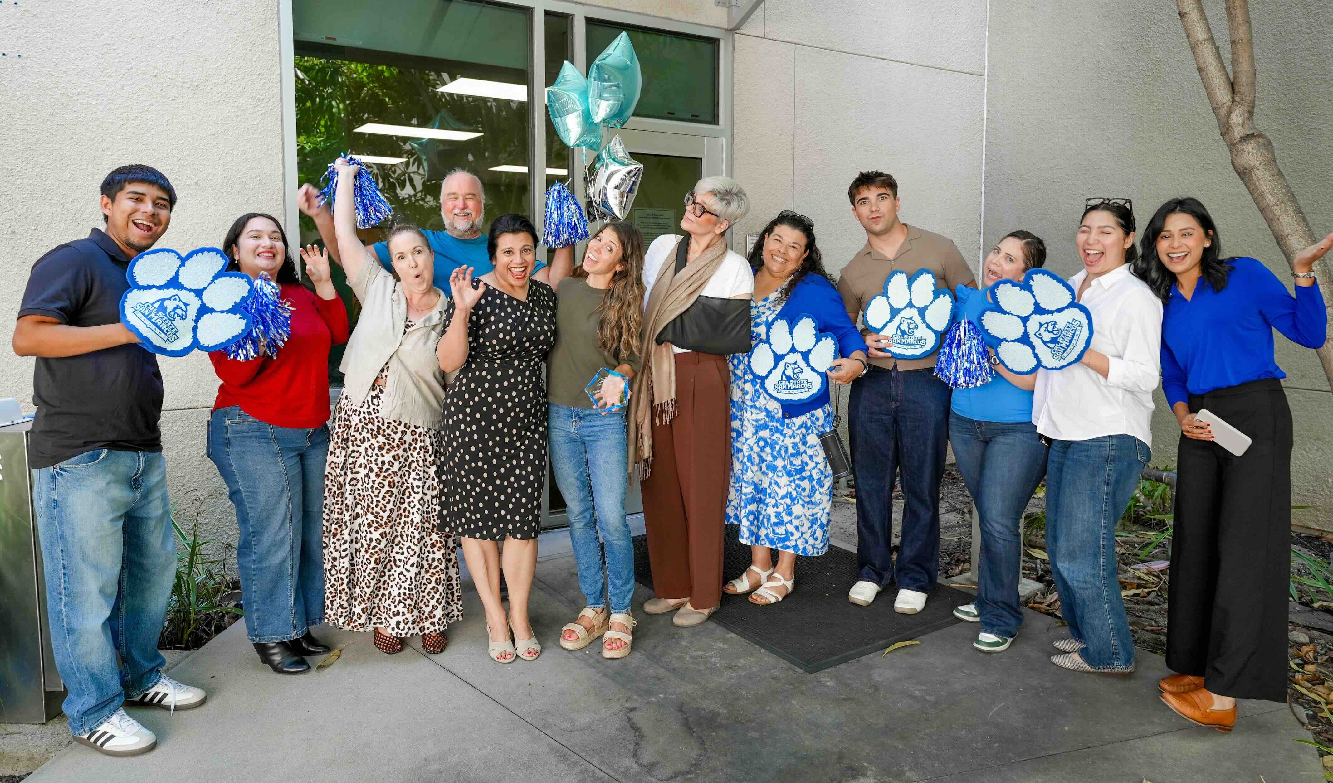 group of people cheering