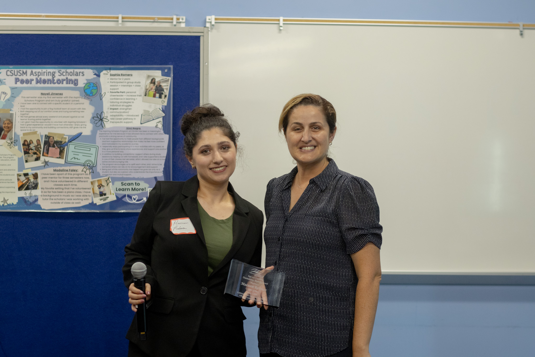 Luz with her award at Maryland Elementary