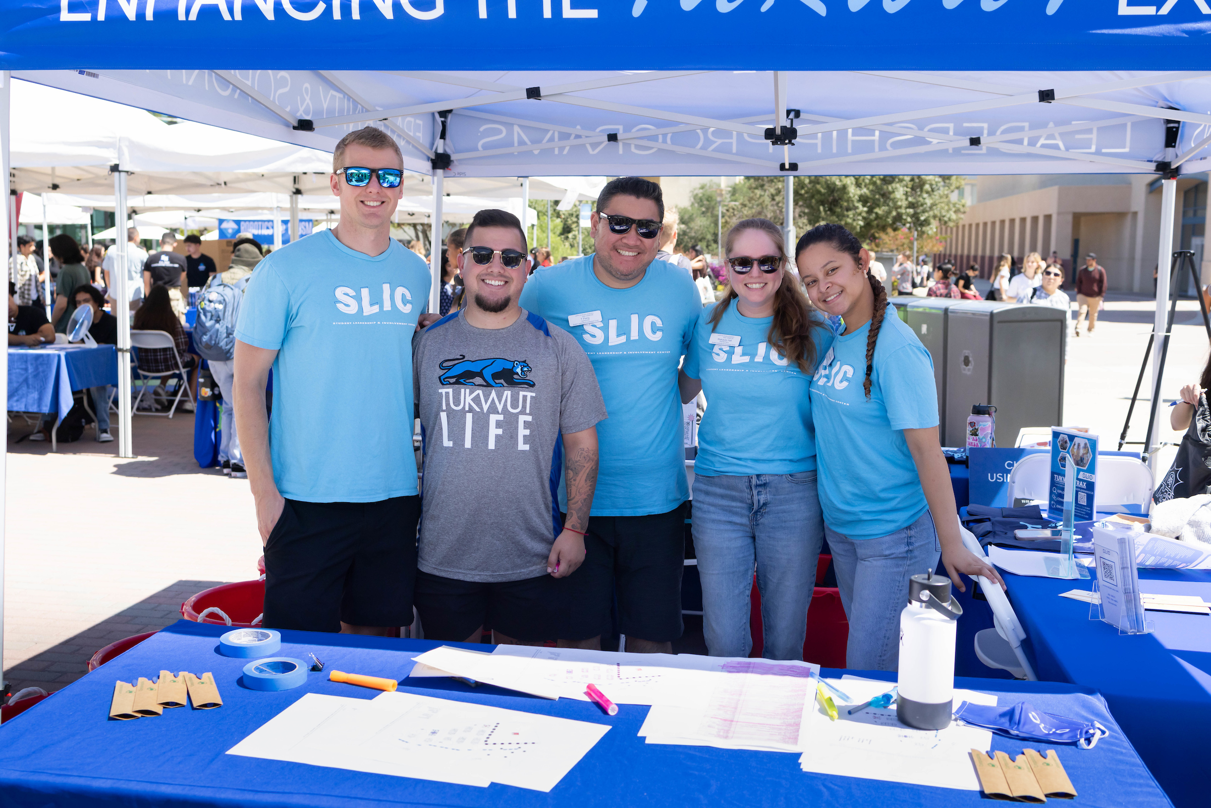 SLIC team standing at SLIC tent during Student Organization Fair