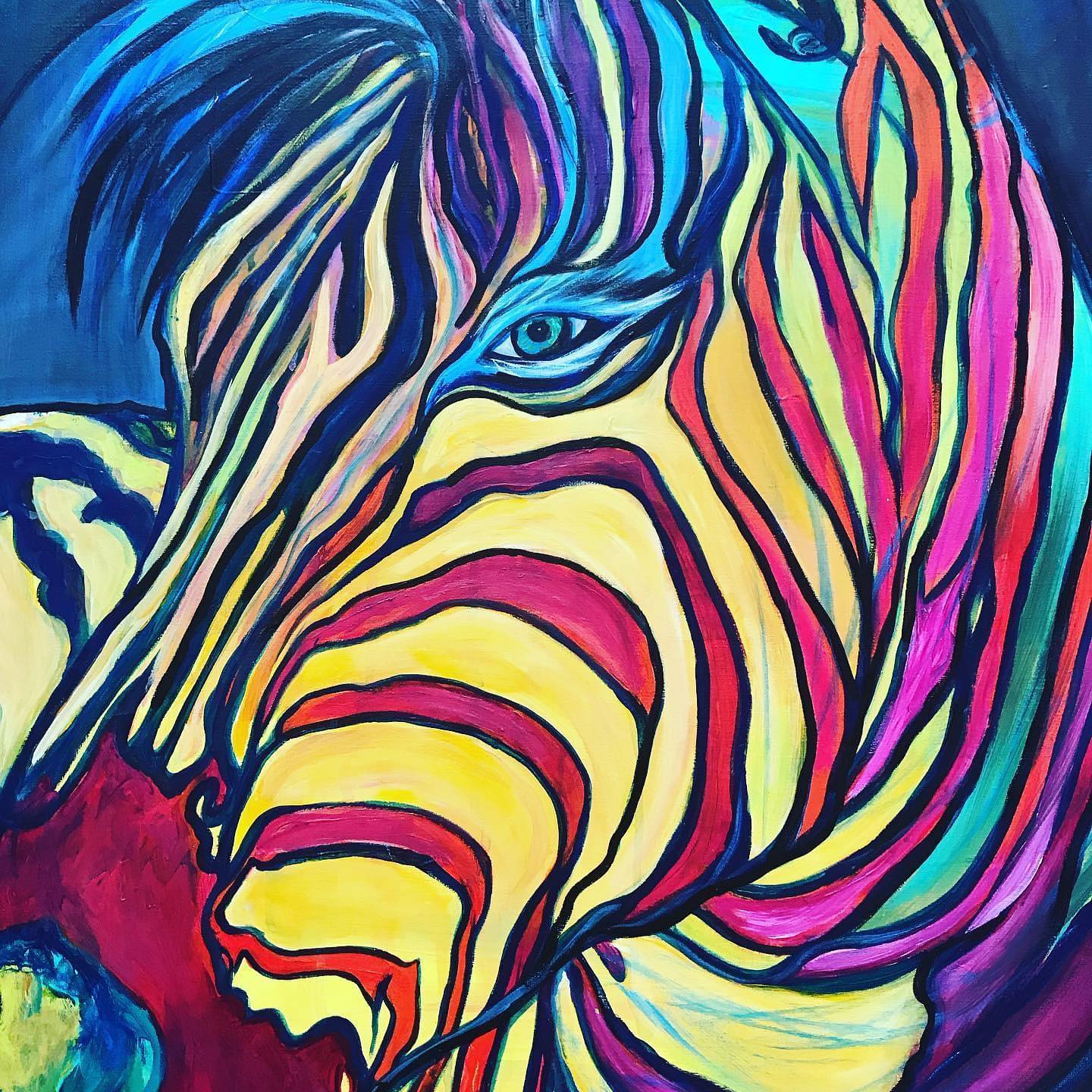 Zebra painted in rainbow colors.