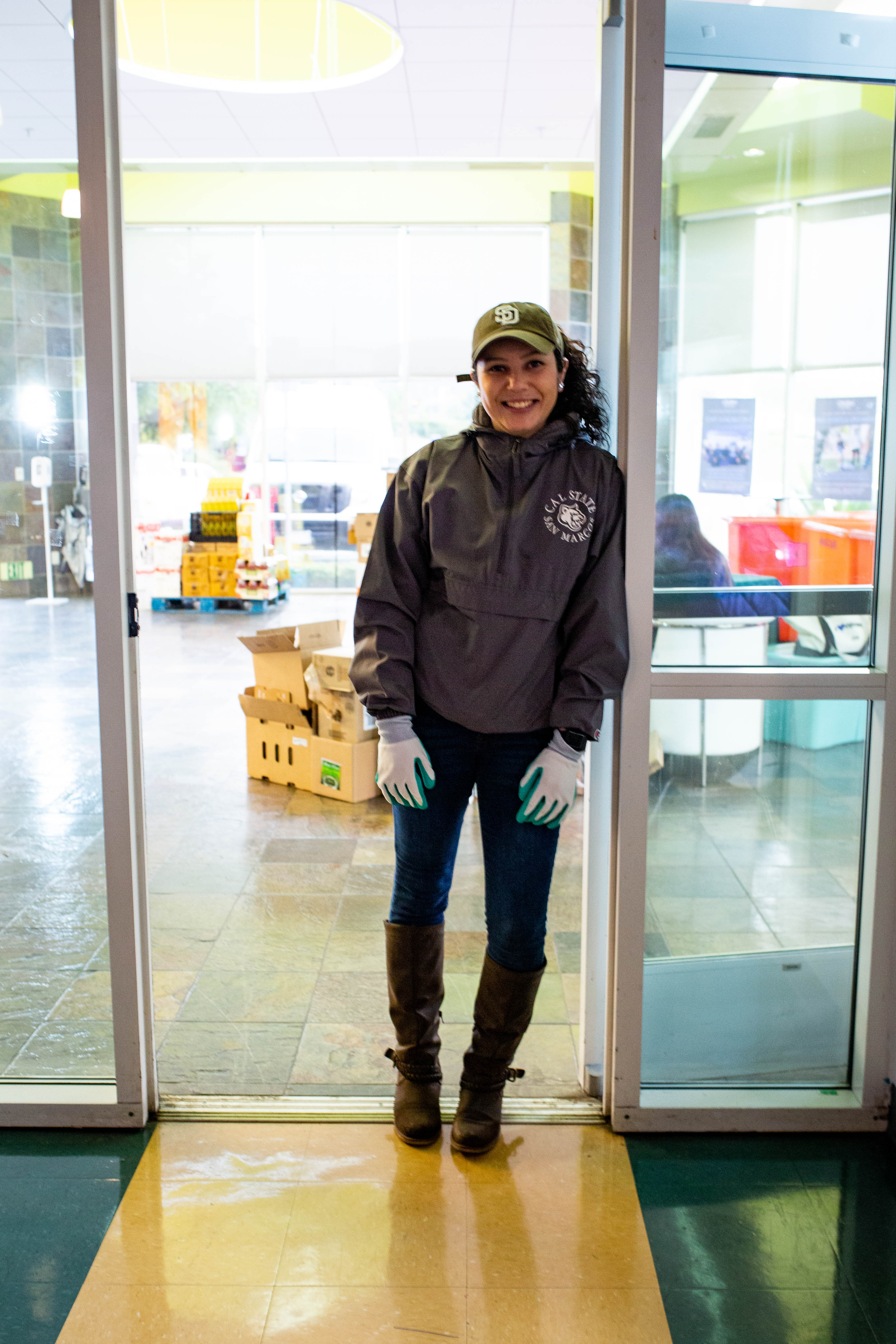 A woman standing in a doorway.