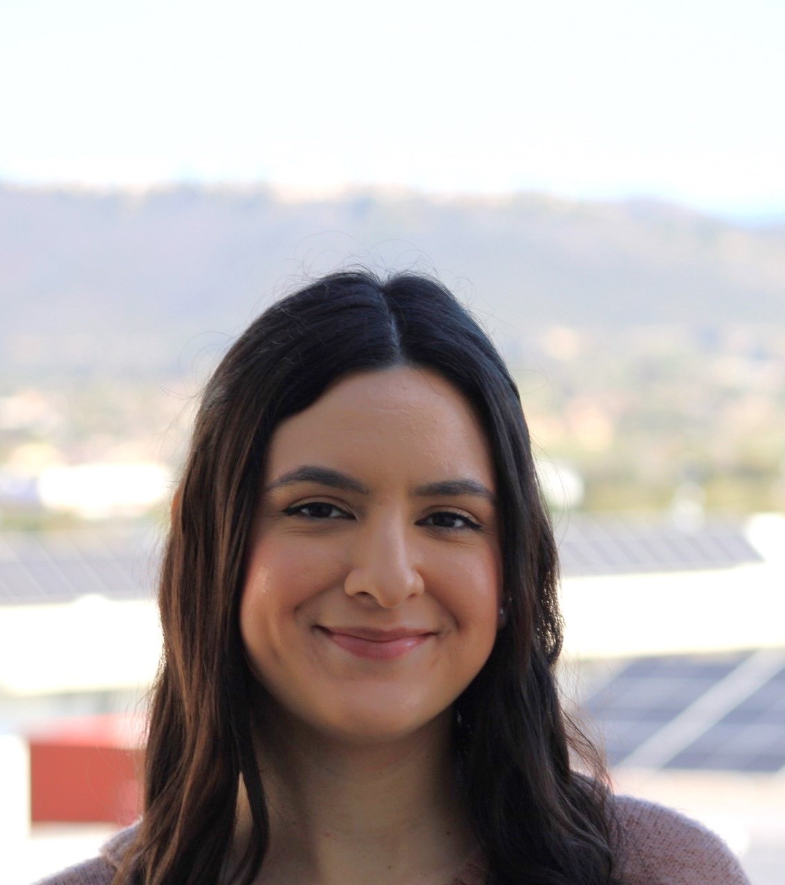 A woman smiling