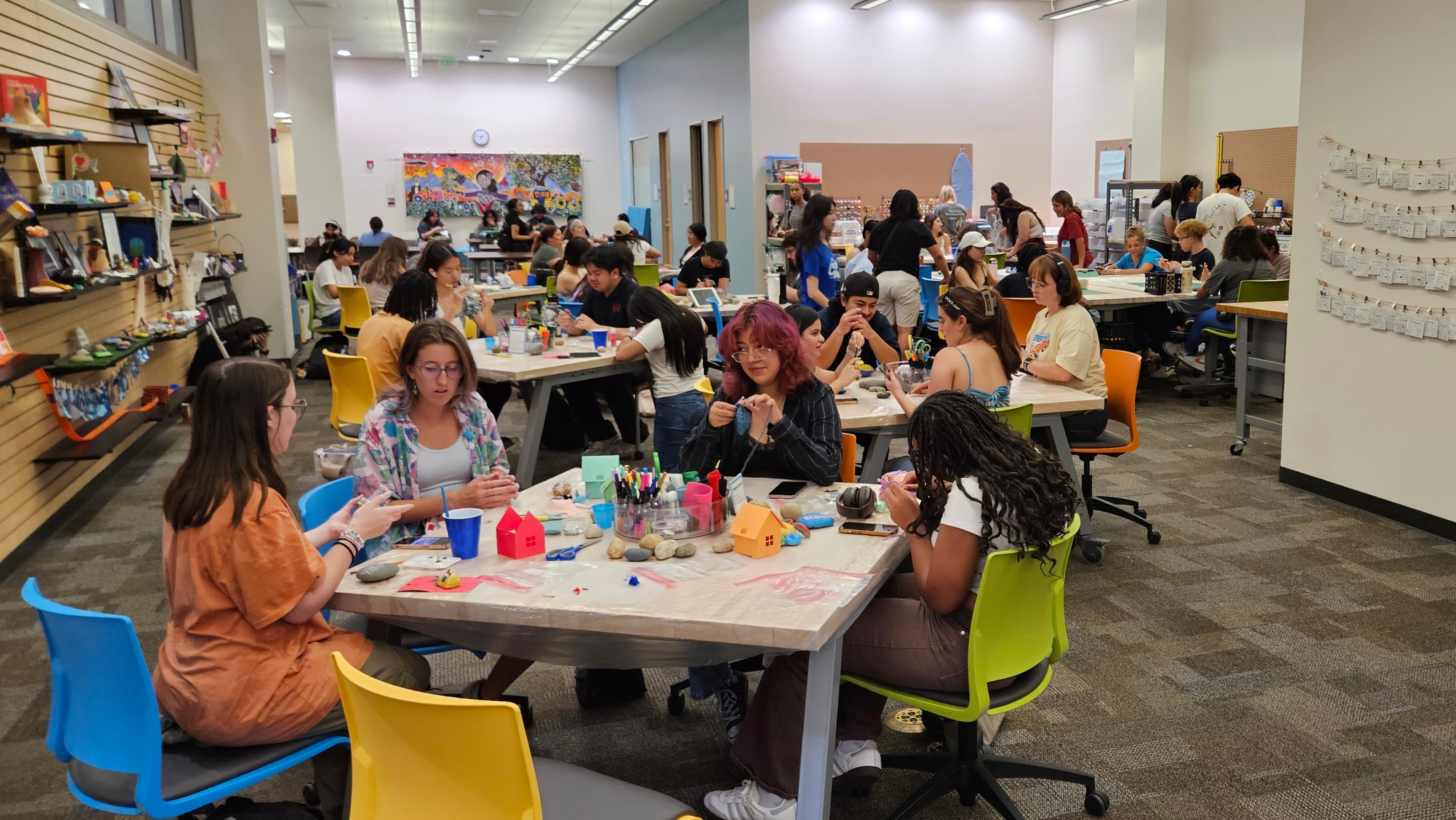 A group of people sitting at tables