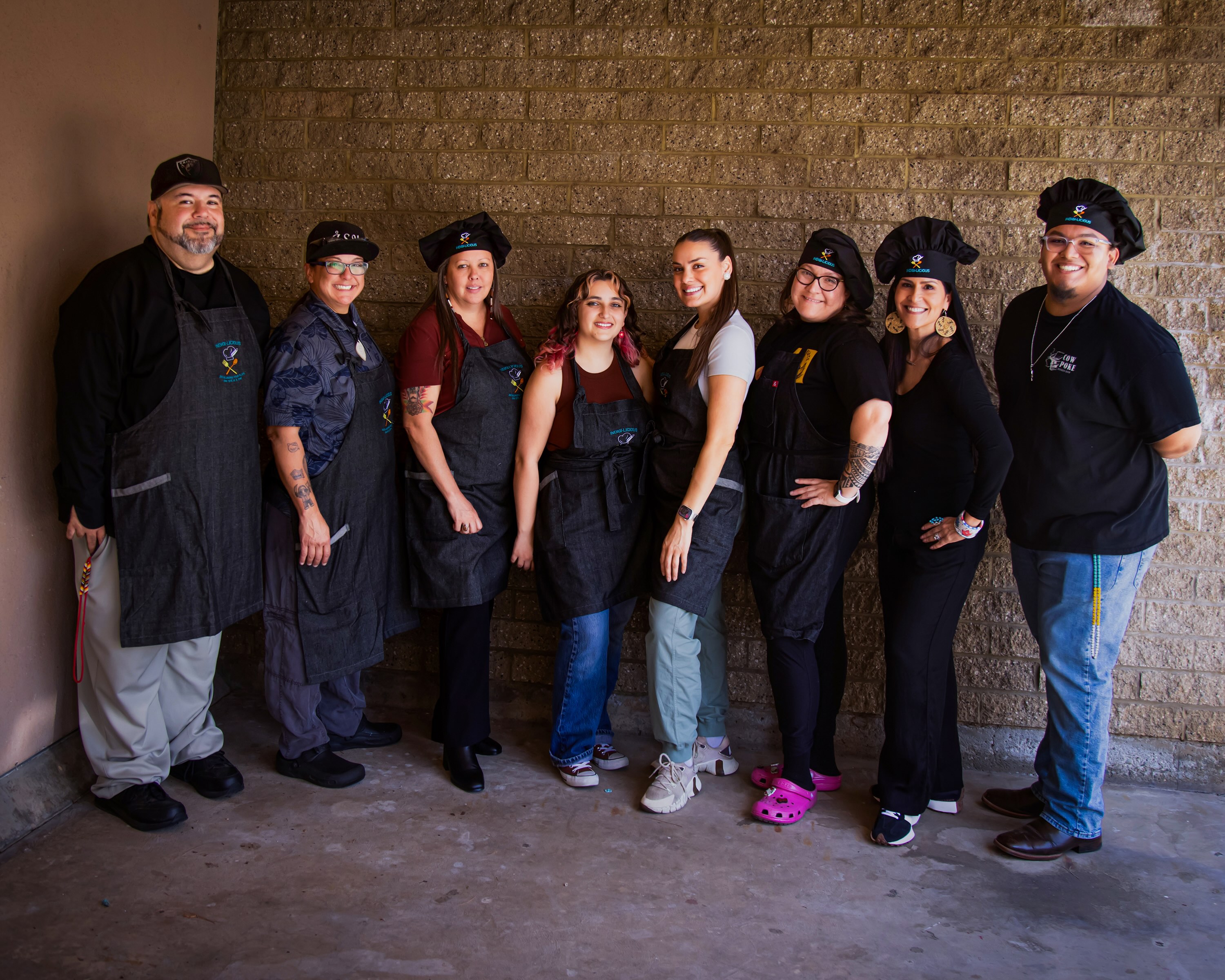 a group of people wearing chef hats and aprons