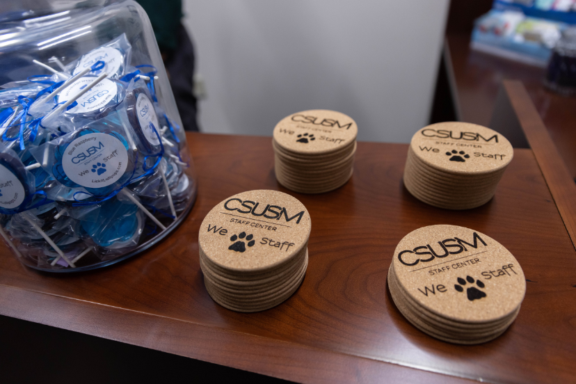 Staff Center coaster and cougar lollipops