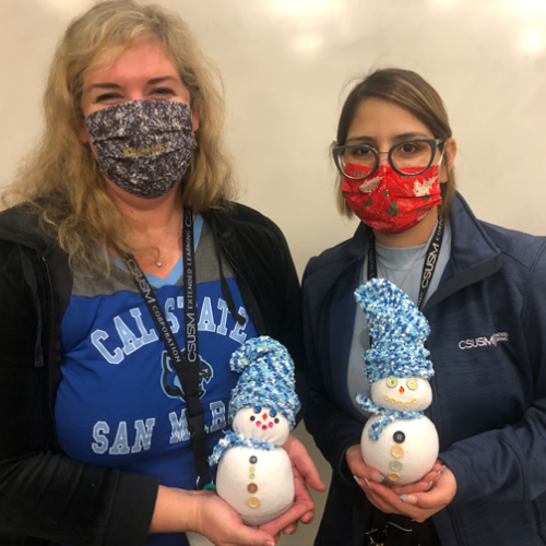 Staff with their snow people