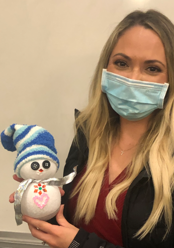 Staff with their snowperson
