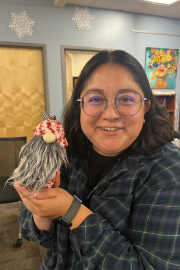 Woman with her crafted gnome
