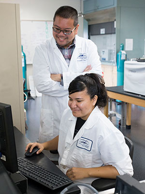 Faculty and student in a lab